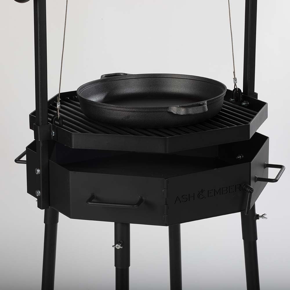 TITAN GREAT OUTDOORS Ash & Ember Santa Maria Grill, Argentine Style Open Fire Grill, Adjustable Cooking Grate with Flywheel, BBQ Grill Comes with Cast Iron Skillet