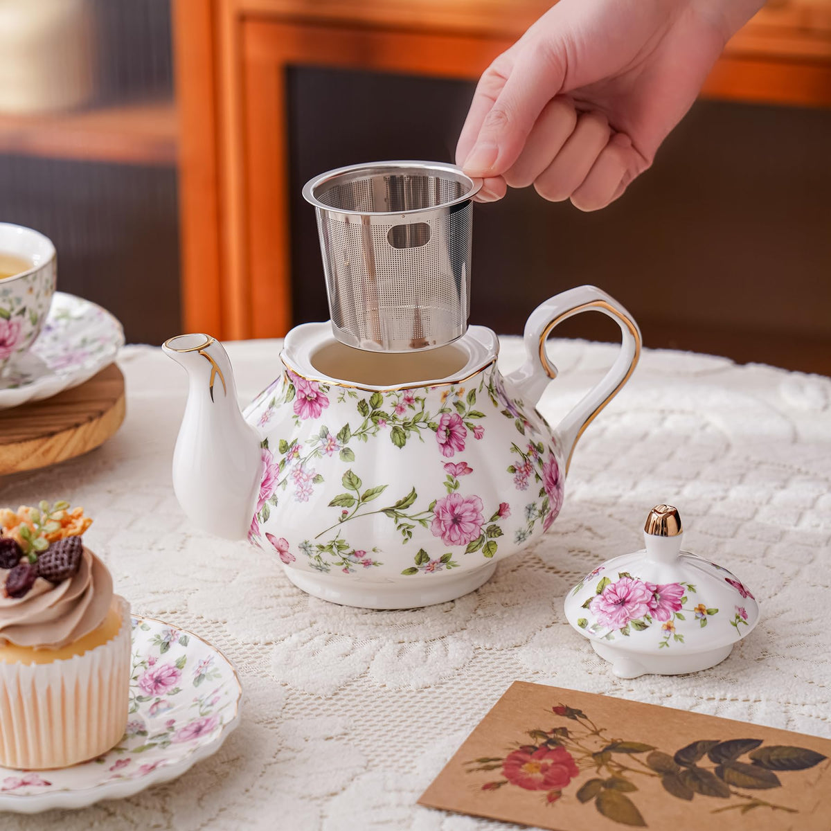 Cozierlavie Small Ceramic Floral Teapot，22oz Tea Pot with Infuser for Blooming and Loose Tea, Coffee，milk(Pink and purple flowers, With tea strainer)