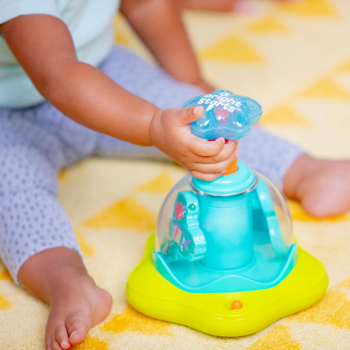 Bright Starts Press & Glow Spinner Cause and Effect Musical Baby Toy, Age 6 Months+