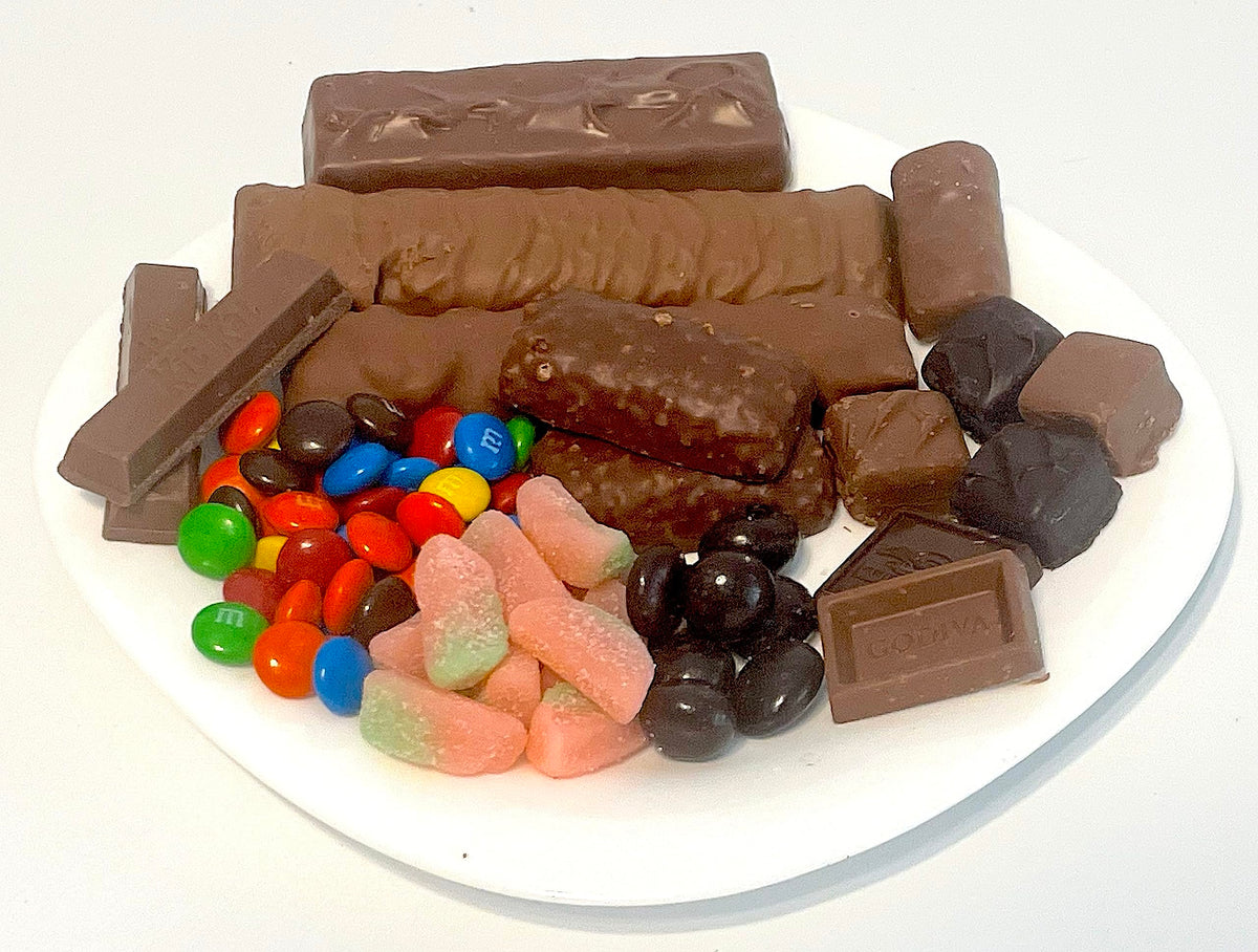 Halloween gourmet gift basket of artisan chocolates, cookies, crunches, and snacks. Perfect for business gifts, birthdays, Halloween parties,