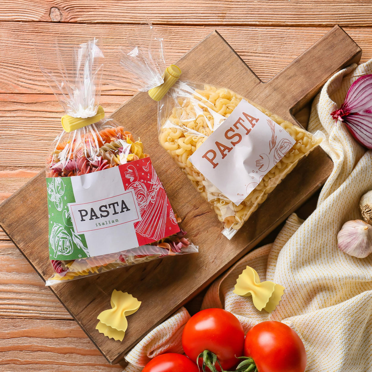 Genuine Fred SNACKARONI Pasta Bag Clips, Set of 4, Two Styles Farfalle and Rigatoni, Squeeze and Lock Bread Bag Clip, Spring-Loaded Clips, Fun Food Storage and Kitchen Accessories