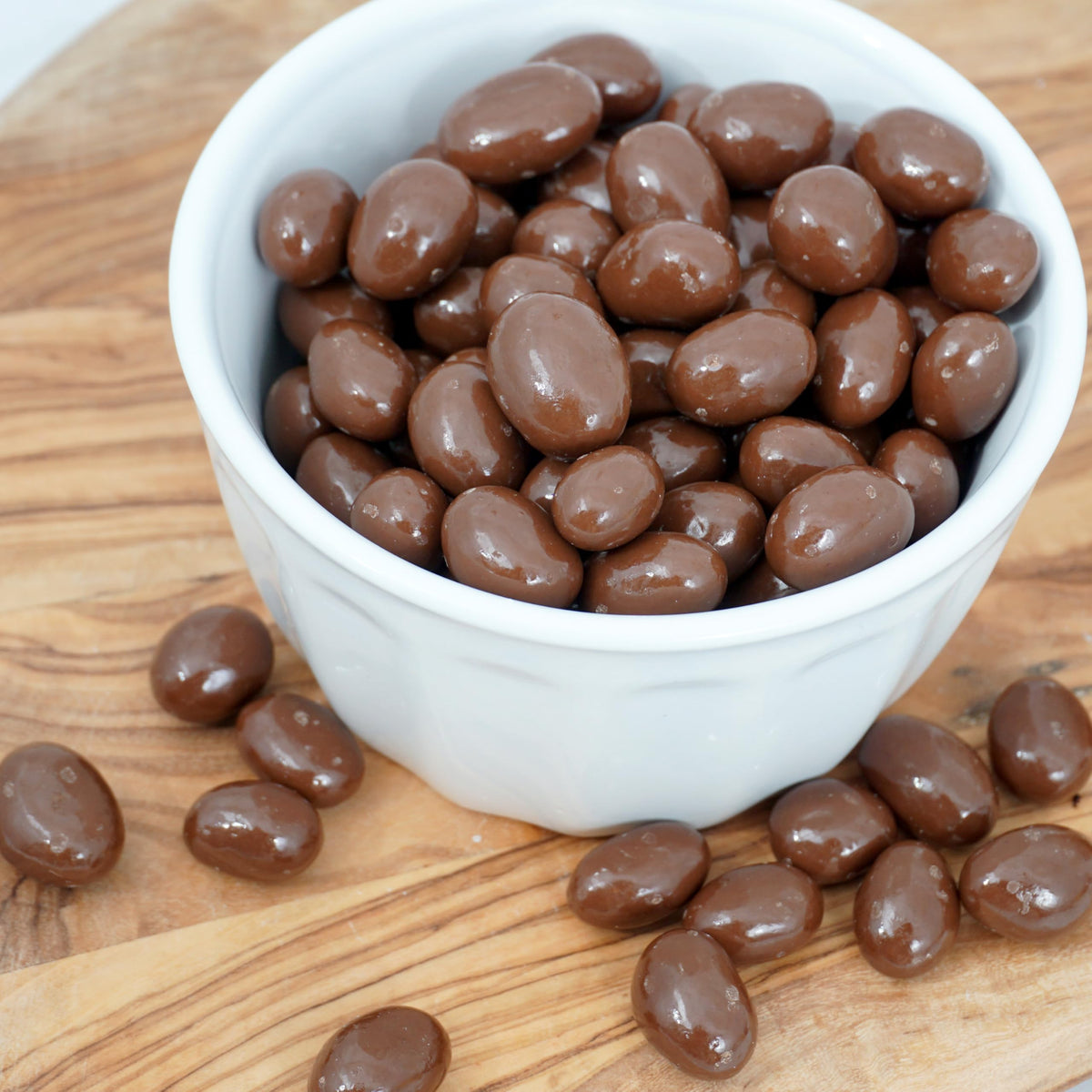 Milk Chocolate Covered Raisins - 2lb Bulk Bag | The Hampton Popcorn & Candy Company